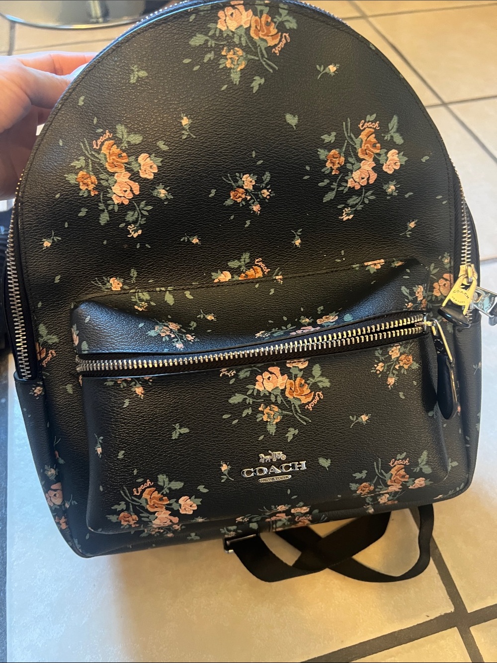 Coach navy blue but looks Black Floral Med Backpack with Peach Roses